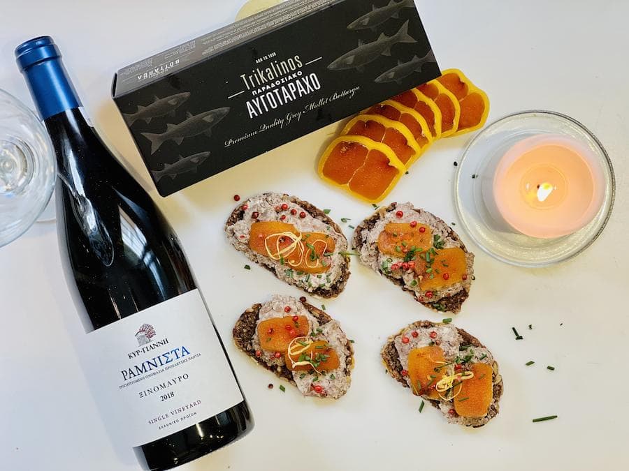 Gourmet Festive Appetizers - Gastronomy Tours Pate and bottarga on bread a bottle red wine Gastronomy Tours - Gastronomy Tours